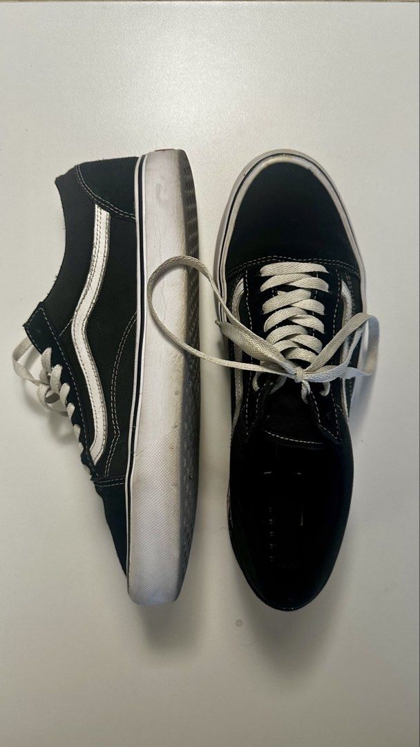 Vans Old Skool UltraCush Lite (Category: Sneakers) located in Makati City. Submitted by migsbaltasar (Listing ID 1470361066, Image 3). Description: - Brand: Vans - Model: Old Skool - Color: Black and White - Feature: UltraCush Lite insoles for extra comfort - Condition: Pre-loved with minor dirt on soles and scuffs on rubber midsoles, still plenty of life left - Style: Classic low-top skate shoes with iconic white side stripe.