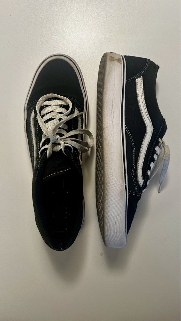 Vans Old Skool UltraCush Lite (Category: Sneakers) located in Makati City. Submitted by migsbaltasar (Listing ID 1470361066, Image 2). Description: - Brand: Vans - Model: Old Skool - Color: Black and White - Feature: UltraCush Lite insoles for extra comfort - Condition: Pre-loved with minor dirt on soles and scuffs on rubber midsoles, still plenty of life left - Style: Classic low-top skate shoes with iconic white side stripe.