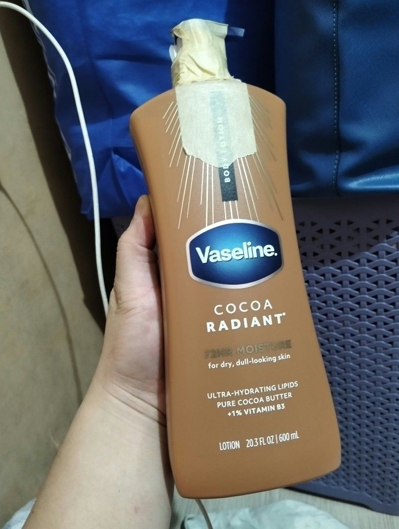 Vaseline Cocoa Radiant Body Lotion 600ml (Category: Body Care) located in Caloocan City. Submitted by girlshopmcollection (Listing ID 1470515191, Image 1). Description: - Product: Vaseline Cocoa Radiant Body Lotion - Size: Large 600 ml / 20.3 fluid ounces - Skin Type: Formulated for dry, dull-looking skin - Key Ingredients: Pure cocoa butter, ultra-hydrating lipids, and 1% vitamin B3 - Condition: Brand new, pump top has tape wrapped around it to 