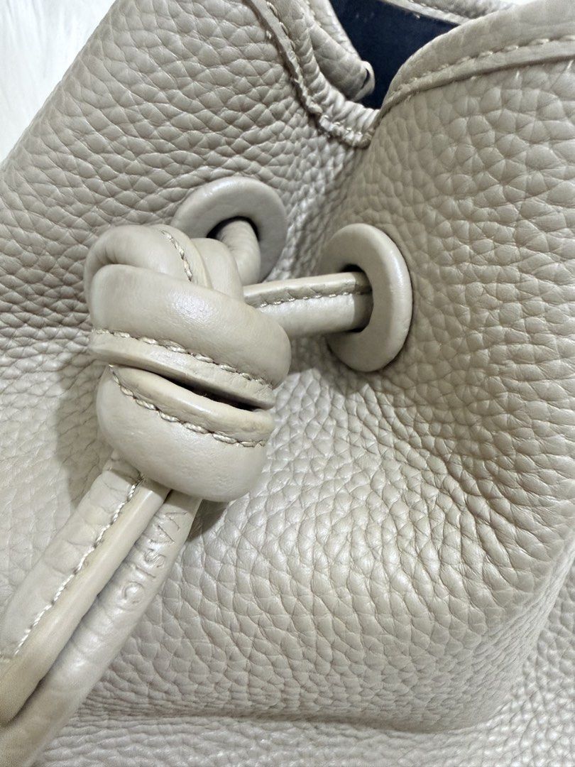 VASIC Bond Mini Bucket Bag Taupe Leather (Category: Cross-body Bags) located in Solano. Submitted by hayami. (Listing ID 1470350829, Image 2). Description: 𝗩𝗔𝗦𝗜𝗖 Bond Mini Knot Leather Bag Can be worn as a crossbody Retails at ₱28,500 Preloved price online starts at ₱14,000.