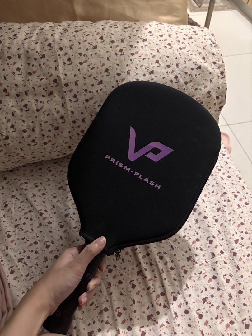 Vatic Pro Prism Flash 16mm Pickleball Paddle (Category: Racket and Ball Sports) located in Manila. Submitted by alionyyy (Listing ID 1470307173, Image 2). Description: VATIC PRO PRISM FLASH 16MM CARBON FIBER PADDLE ▫️Condition: Like New | Used Only 3-4 Times last June ▫️Inclusions: Original Zippered Cover with Purple Branding ▫️Surface: Textured Surface for Enhanced Spin and Control ▫️Handle: Black Handle with Original Vatic Pro Grip ▫️Ideal For: