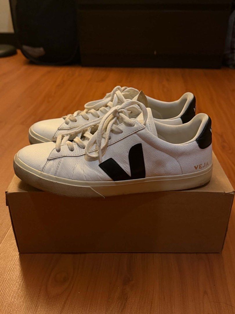 Veja Campo Extra White Black Sneakers (Category: Casual Shoes) located in Paranaque City. Submitted by preloveditems111 (Listing ID 1470541462, Image 2). Description: - Brand/Model: Veja Campo - Colorway: Extra White & Black - Size: EU 45 / US 11.5 / UK 11 - Material: Leather upper with durable rubber sole - Design: Classic side V logo detail - Inclusions: Comes with original shoebox - Condition: Excellent, ready to wear.