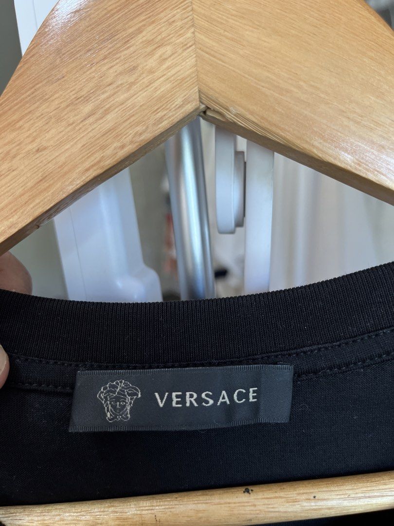 Versace Medusa (Category: Luxury Apparel) located in Tayug. Submitted by thriftyshady_ (Listing ID 1470363876, Image 2). Description: Versace XL on tag Dimes: 21.5x27 No issue 10/10 Condition and color rate As new condition.
