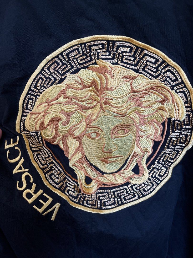 Versace Medusa (Category: Luxury Apparel) located in Tayug. Submitted by thriftyshady_ (Listing ID 1470363876, Image 3). Description: Versace XL on tag Dimes: 21.5x27 No issue 10/10 Condition and color rate As new condition.