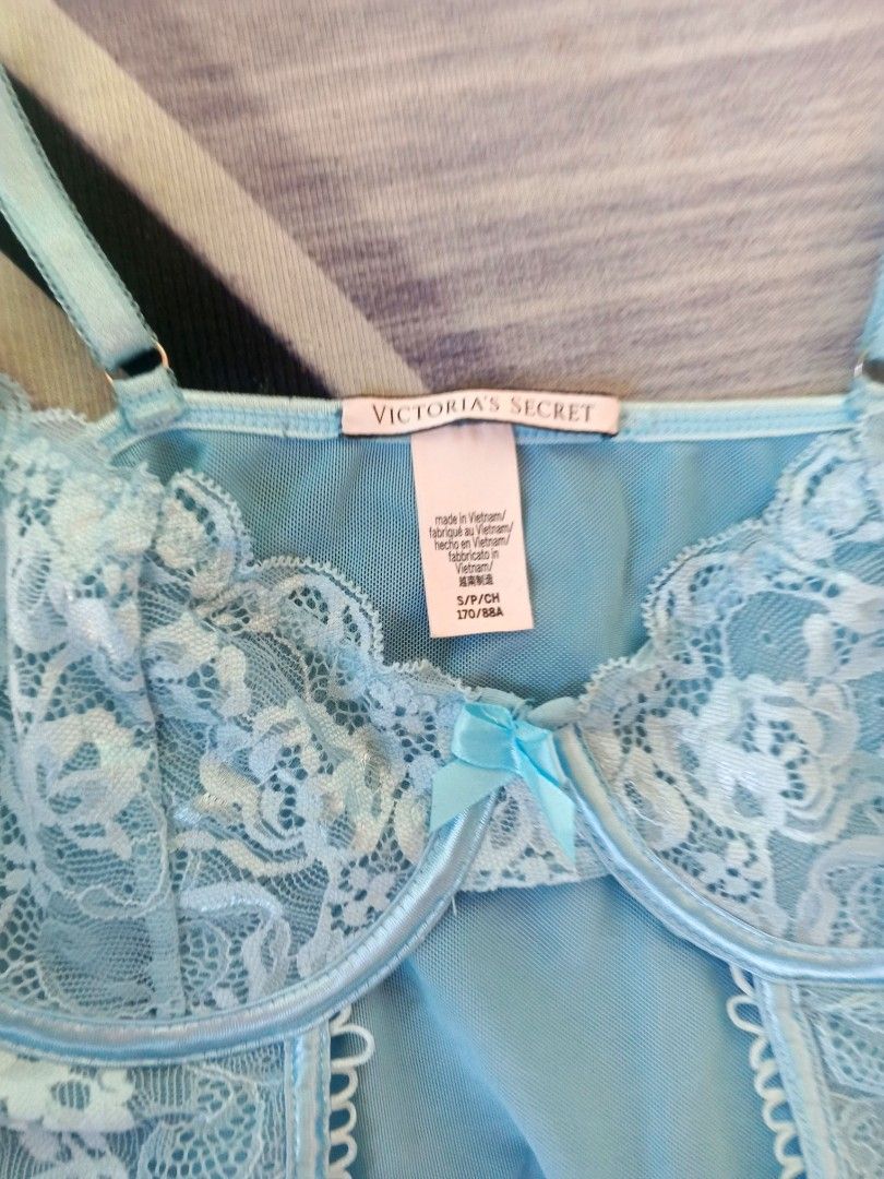 Victoria secret Light Blue Lace Corset Top with Garters (Category: Others Tops) located in Manila. Submitted by icamalicdem29 (Listing ID 1458181758, Image 3). Description: - Light blue corset top - Features lace detailing on bust and front panels - Adjustable straps and garter straps attached - Cute little bow detail in the center - Versatile: great for layering or as a statement piece.