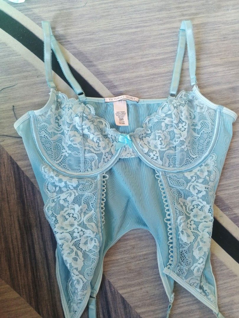 Victoria secret Light Blue Lace Corset Top with Garters (Category: Others Tops) located in Manila. Submitted by icamalicdem29 (Listing ID 1458181758, Image 2). Description: - Light blue corset top - Features lace detailing on bust and front panels - Adjustable straps and garter straps attached - Cute little bow detail in the center - Versatile: great for layering or as a statement piece.
