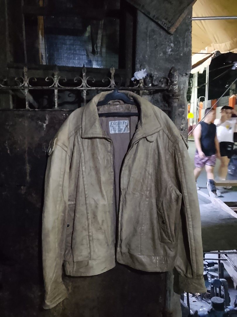 Vintage Expedition by Robert Comstock Genuine Leather Jacket (Category: Coats, Jackets and Outerwear) located in Manila. Submitted by warmcloud-06f3 (Listing ID 1470498892, Image 3). Description: - Brand: Expedition by Robert Comstock - Material: 100% Genuine Leather (Verified inside tag) - Color: Earthy brown - Style: Classic bomber with full zip closure and front pockets - Weight/Texture: Heavyweight with a rugged, durable finish - Condition: E