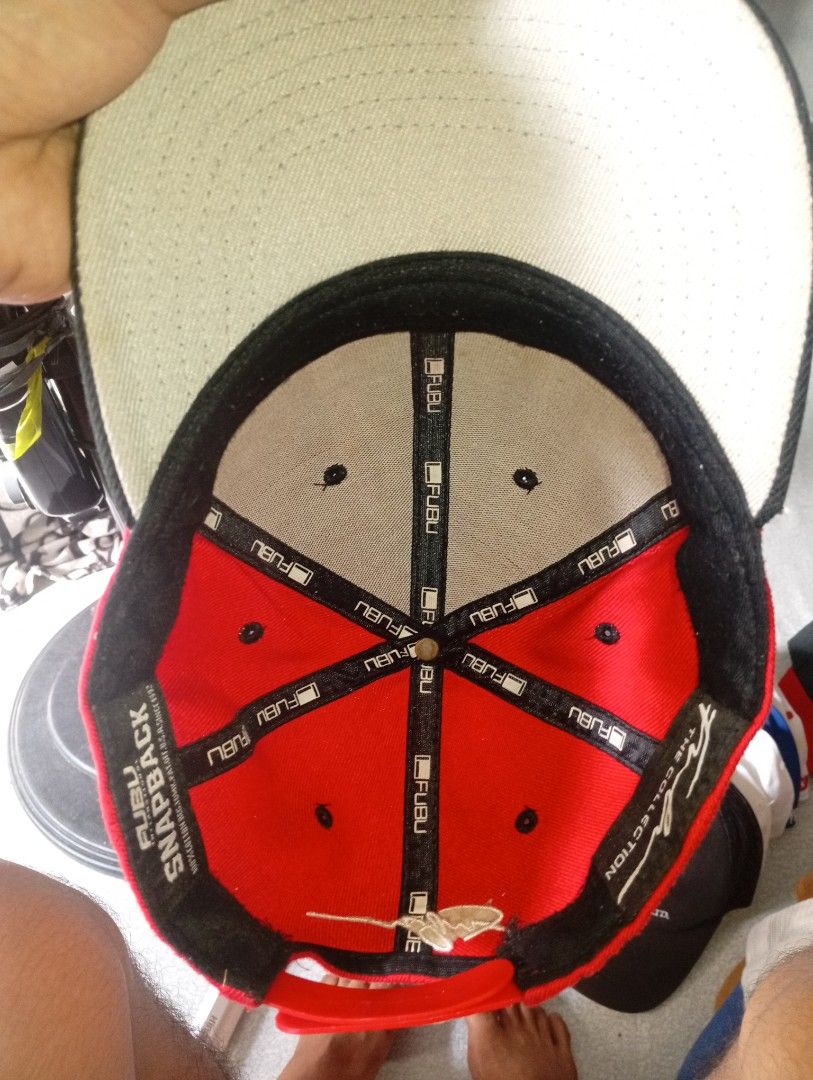 Vintage FUBU Monogram Snapback Y2K (Category: Caps & Hats) located in Manila. Submitted by markgodwin (Listing ID 1470546466, Image 3). Description: ​Authentic vintage FUBU International snapback. Solid 3D front embroidery at maganda ang porma. Flaws: May bawas na 2 pins sa plastic strap sa likod at may manipis na kulubot sa ilalim ng visor (underbrim). Madaling maayos o maisuot as-is! Price: ₱1,200 (Slightly negotiable)..