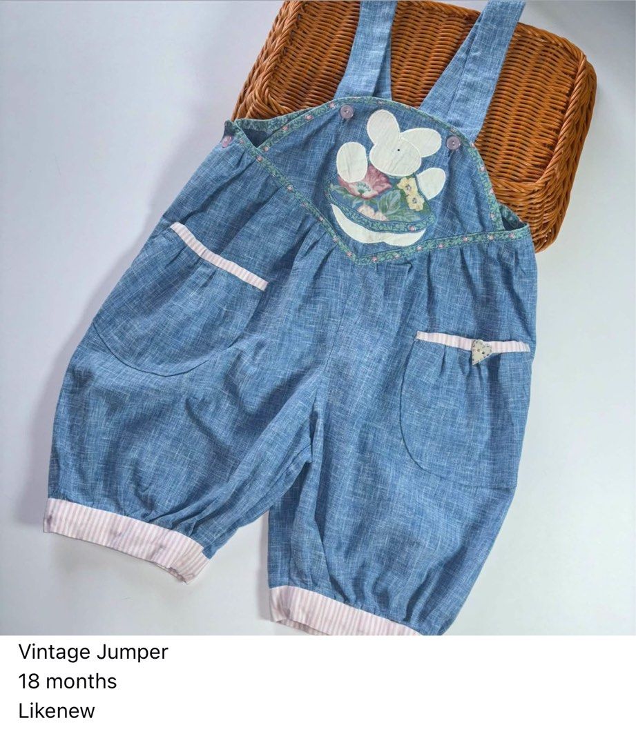 Vintage Jumper 18 months (Category: Babies & Kids Fashion) located in Manila. Submitted by miamoire (Listing ID 1470556637, Image 1). Description: - Size: 18 months - Color: Vintage blue denim with pink and white striped trim - Design: Adorable bunny appliqué holding flowers and a cute heart button - Features: Two large front pockets and adjustable button shoulder straps - Condition: Smoke-free home, great vintage find.