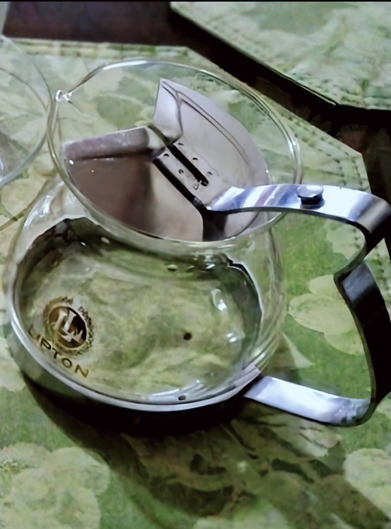 Vintage Lipton tea pot (Category: Coffee & Tea Tableware) located in Bulacan. Submitted by mitchikoscollection (Listing ID 1470381563, Image 1). Description: 🩷‼️Courier Lalamove only‼️1K above J&T‼️🩷 Authentic Original Rare Vintage Small Glass Tea pot with removable Stainless steel Handle ...