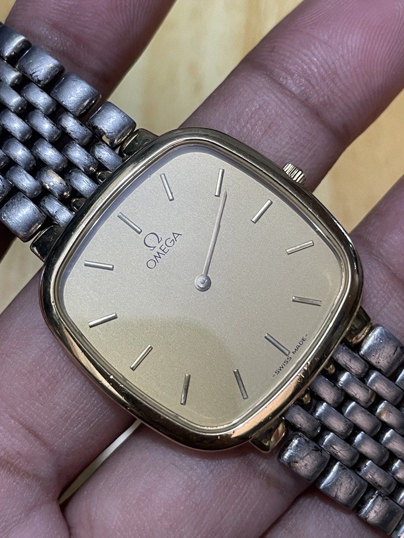 Vintage Omega De Ville Quartz (Category: Men's Watches) located in Taguig. Submitted by tester1x (Listing ID 1470414209, Image 3). Description: Vintage Omega De Ville Ultra Thin Watch Swiss Made Quartz Gold Tone Square Case Gold Tone Dial Omega Bracelet 30 x 30mm 6.5 wrist size Issue: Bracelet Faded Yun Gold Tone “WATCH ONLY” .