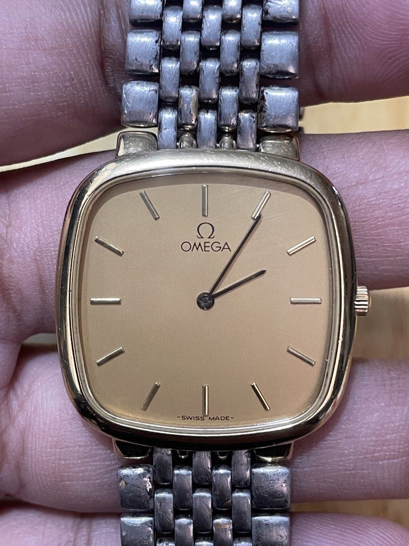 Vintage Omega De Ville Quartz (Category: Men's Watches) located in Taguig. Submitted by tester1x (Listing ID 1470414209, Image 2). Description: Vintage Omega De Ville Ultra Thin Watch Swiss Made Quartz Gold Tone Square Case Gold Tone Dial Omega Bracelet 30 x 30mm 6.5 wrist size Issue: Bracelet Faded Yun Gold Tone “WATCH ONLY” .