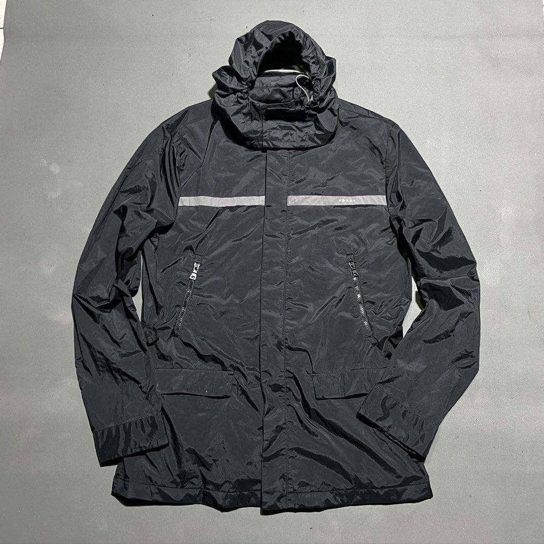 Vintage Prada Sport - Parka Windbreaker Jacket (Category: Luxury Apparel) located in Bacolod City. Submitted by rndm.wears (Listing ID 1470529192, Image 1). Description: Vintage Prada Windbreaker Jacket Packable Hood Adjustable sides with snap buttons Length: 32 Width: 23.