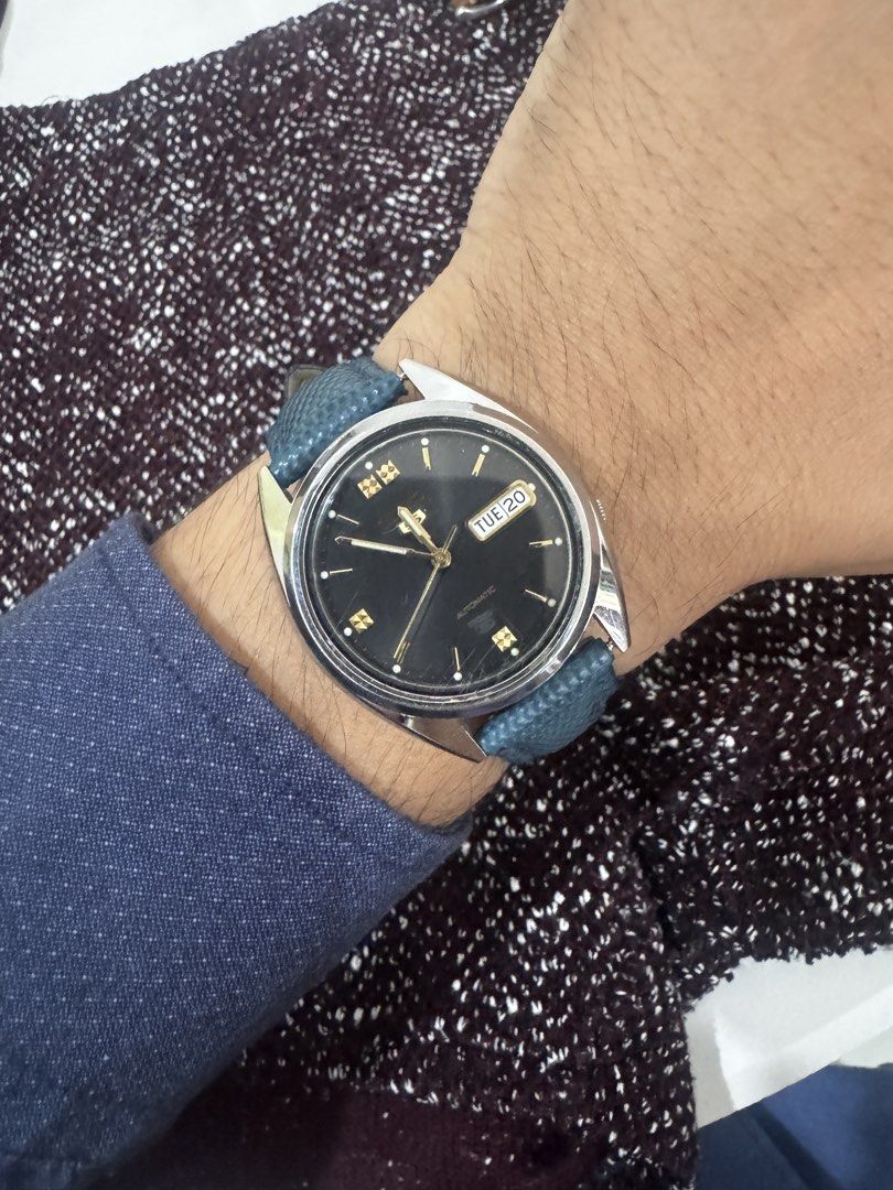 Vintage Seiko 5 Automatic Watch Black Dial Blue Strap (Category: Men's Watches) located in Makati City. Submitted by yungkatabiko (Listing ID 1470359466, Image 1). Description: Vintage Seiko 5 Automatic (7S26-3040) – Black Dial with Gold Accents – Rare Find 🔥🔥🔥 Selling my vintage Seiko 5, a classic piece from the early 2000s. This is the Seiko 5 ref. 7S26-3040 with a stunning black dial and distinct gold markers. The watch is in good working c