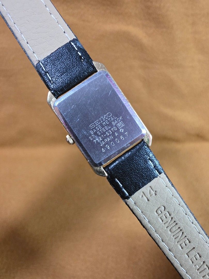 Vintage Seiko Quartz Rectangular Watch with Black Leather Strap (Category: Women's Watches) located in Rosales. Submitted by akumie30 (Listing ID 1470532275, Image 3). Description: - Authentic vintage rectangular Seiko watch imported from Japan - Elegant gold-tone case paired with a textured black leather strap - Minimalist champagne dial with clean stick markers and simple hands - Reliable quartz movement for accurate timekeeping - Versatile des