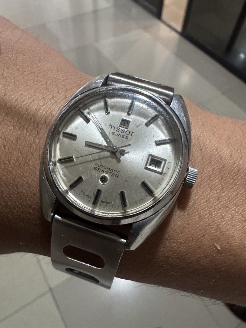Vintage Tissot Seastar Automatic Watch (Category: Men's Watches) located in Laguindingan. Submitted by kixseven (Listing ID 1470353527, Image 1). Description: - Brand: Tissot Seastar - Movement: Swiss-made automatic - Dial: Silver with 3 o'clock date window - Crown: Textured with Tissot logo - Strap: Stainless steel racing-style perforated bracelet - Condition: Keeps good time, normal signs of wear on case and bracelet from regular use - NO COD ❌