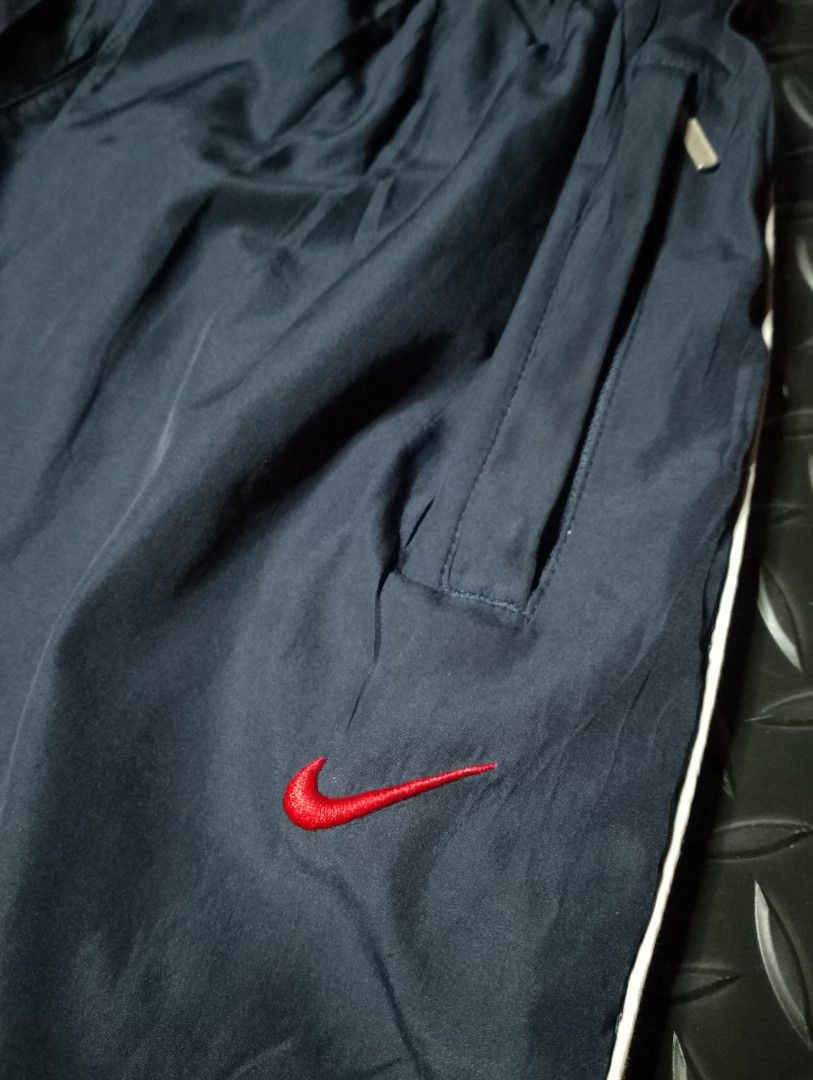 Vintage Y2k Nike Track Pants (Category: Activewear) located in Baguio. Submitted by bado.feels (Listing ID 1470478297, Image 2). Description: Issue: Pinhole Size 26-38 Length 37 Thigh 12 Leg Opening 8 550+sf.