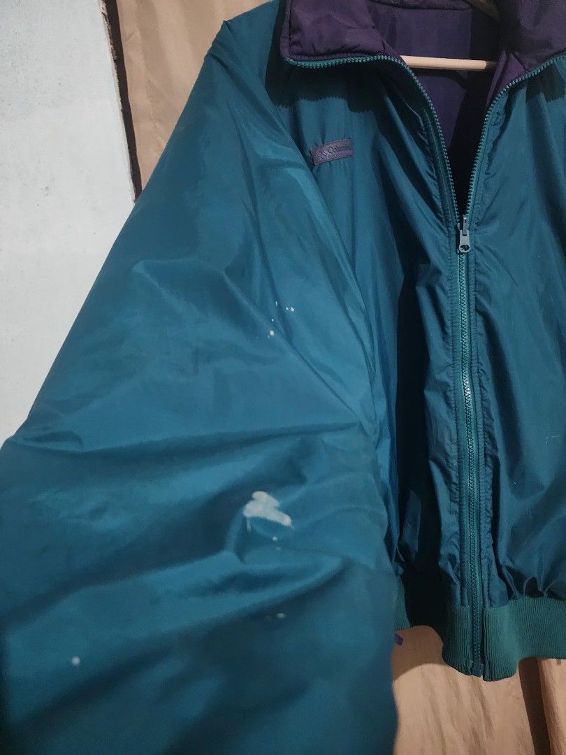 Vintage Columbia 1990s Reversible Puffer bomber Jacket (Category: Coats, Jackets and Outerwear) located in Bataraza. Submitted by hansfinds.thriftstore (Listing ID 1470476626, Image 3). Description: Item Specifics • Brand: Columbia • Size: XL (Measures 28" x 28") • Style: Reversible Bomber Jacket • Color: Teal / Purple • Condition: Pre-owned (As Is - See notes) Description Vintage 90s Columbia Sportswear Reversible Jacket Classic teal and purple 