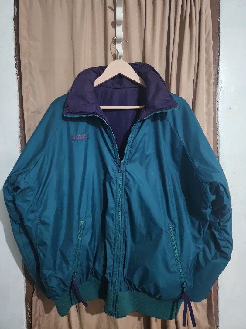 Vintage Columbia 1990s Reversible Puffer bomber Jacket (Category: Coats, Jackets and Outerwear) located in Bataraza. Submitted by hansfinds.thriftstore (Listing ID 1470476626, Image 1). Description: Item Specifics • Brand: Columbia • Size: XL (Measures 28" x 28") • Style: Reversible Bomber Jacket • Color: Teal / Purple • Condition: Pre-owned (As Is - See notes) Description Vintage 90s Columbia Sportswear Reversible Jacket Classic teal and purple 