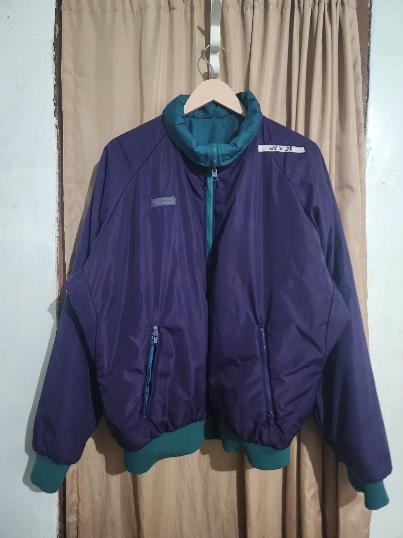 Vintage Columbia 1990s Reversible Puffer bomber Jacket (Category: Coats, Jackets and Outerwear) located in Bataraza. Submitted by hansfinds.thriftstore (Listing ID 1470476626, Image 2). Description: Item Specifics • Brand: Columbia • Size: XL (Measures 28" x 28") • Style: Reversible Bomber Jacket • Color: Teal / Purple • Condition: Pre-owned (As Is - See notes) Description Vintage 90s Columbia Sportswear Reversible Jacket Classic teal and purple 