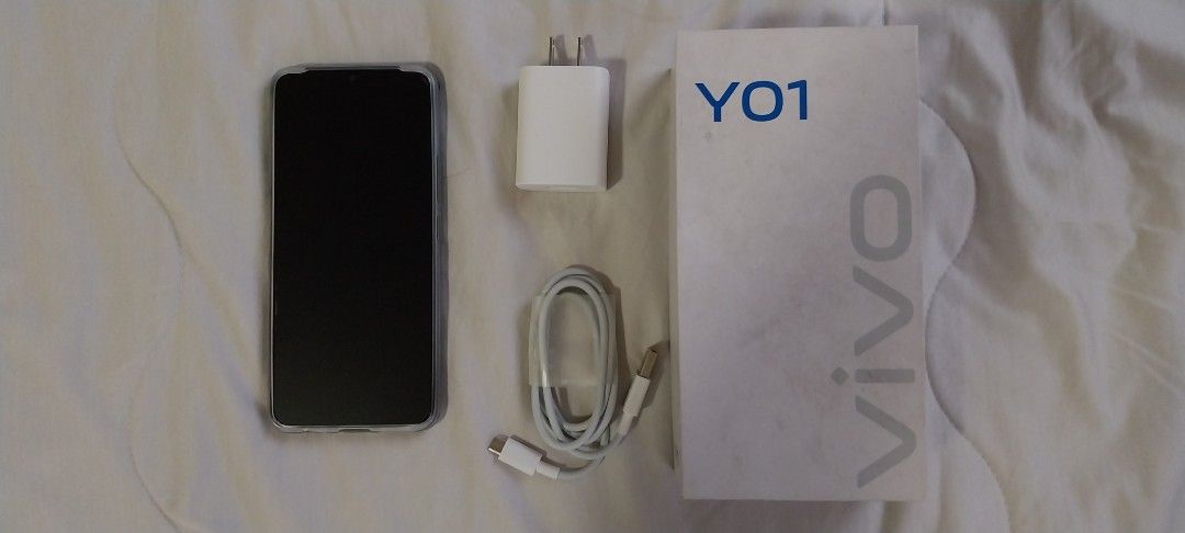 Vivo Y01 (Category: Vivo) located in Quezon City. Submitted by enryks.boxofstuff (Listing ID 1470372014, Image 1). Description: - Brand/Model: Vivo Y01 (V2118) - Color: Blue - Storage: 2GB RAM / 32GB ROM - Display: 6.51" HD+ Halo FullView Display - Battery: 5000mAh long-lasting battery - Condition: Lightly used as seen in photos - Inclusions: Original box, charger, and protective clear case.