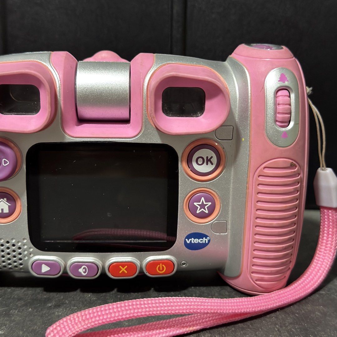 VTech Kidizoom Twist Plus Pink Digital Camera (Category: Cameras) located in Cuyapo. Submitted by blacksheepshop (Listing ID 1470518372, Image 2). Description: - Model: VTech Kidizoom Twist Plus (Pink/Silver) - 2.0 Mega Pixels with 4X digital zoom - Rotating lens for easy selfies - Built-in LCD screen and fun control buttons - Includes attached pink wrist strap - Captures both photos and videos - Powered by standard batteries - Great, durable toy