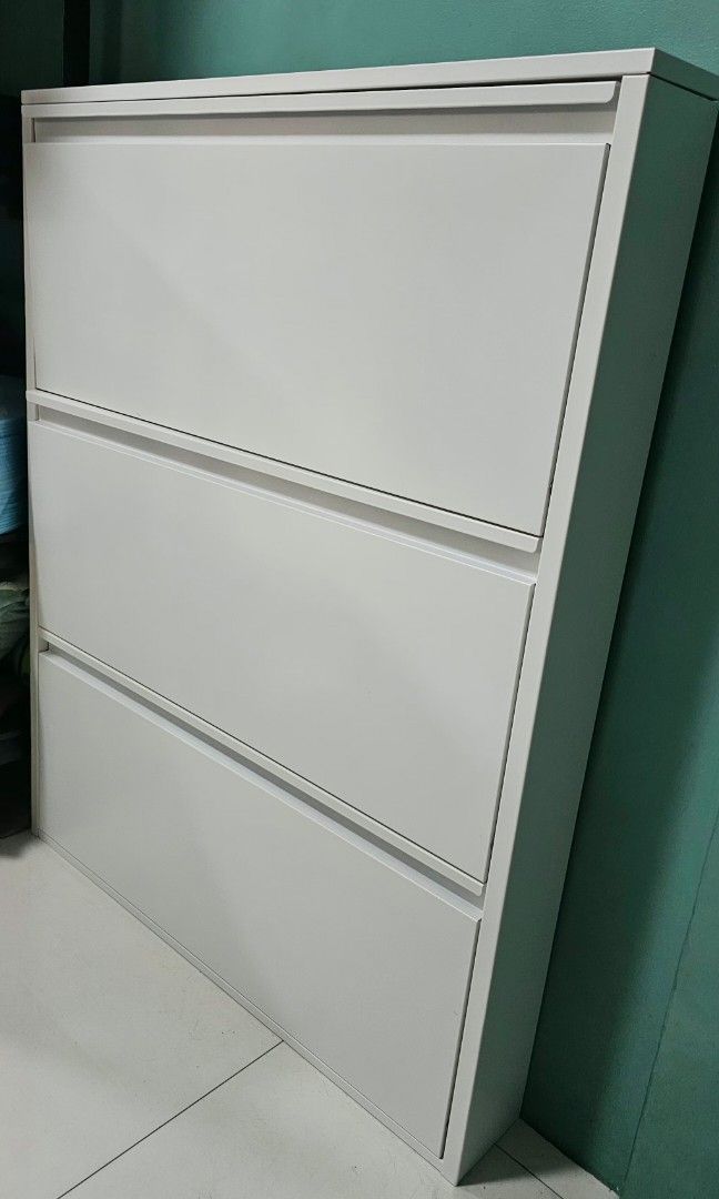 Wall shoe rack (Category: Shelves, Cabinets & Racks) located in Quezon City. Submitted by happy.cutie888 (Listing ID 1470368689, Image 2). Description: Wall Metal Shoe Rack Maganda para sa maliliit ang space. Condo apartment. Rfs: Sinukat lang mga shoes. Di na ginamit. San Juan City..