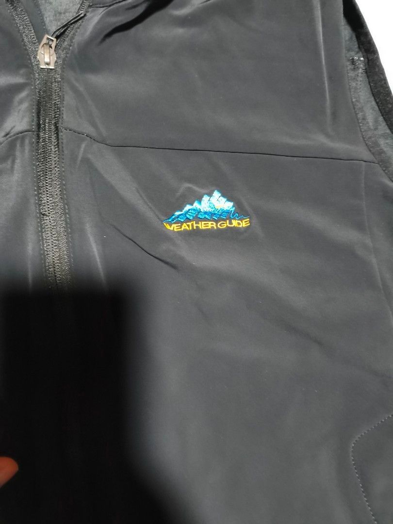 Weather Guide Vest - Black (Category: Coats, Jackets and Outerwear) located in Pasig City. Submitted by tobyrama (Listing ID 1470536565, Image 3). Description: Black Weather Guide vest with a full zipper closure. Features a small embroidered logo on the chest. The vest has two front pockets and a high collar. The size is medium. ✔️ Brand: Weather Guide ✔️ Design: Waterproof Full Zip Vest ✔️ Color: Black ✔️ Size: Medium (on tag) ✔️ Condition: Almo