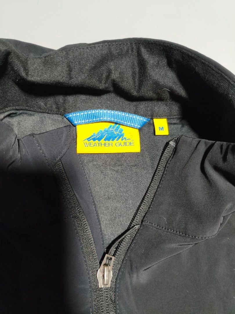 Weather Guide Vest - Black (Category: Coats, Jackets and Outerwear) located in Pasig City. Submitted by tobyrama (Listing ID 1470536565, Image 2). Description: Black Weather Guide vest with a full zipper closure. Features a small embroidered logo on the chest. The vest has two front pockets and a high collar. The size is medium. ✔️ Brand: Weather Guide ✔️ Design: Waterproof Full Zip Vest ✔️ Color: Black ✔️ Size: Medium (on tag) ✔️ Condition: Almo