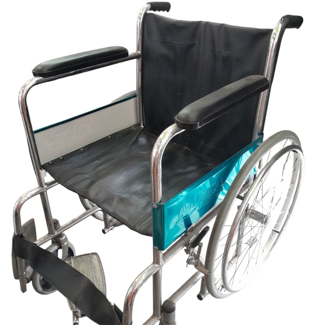 Wheelchair with Black Upholstery (Category: Wheelchairs) located in Mandaluyong City. Submitted by twixie94147 (Listing ID 1470369007, Image 3). Description: - Frame: Durable chrome steel - Material: Easy-to-clean black synthetic leather seat and backrest - Comfort: Padded armrests and supportive calf strap on footrests - Mobility: Large rear spoked wheels and smooth front casters - Convenience: Space-saving foldable design for easy transport and