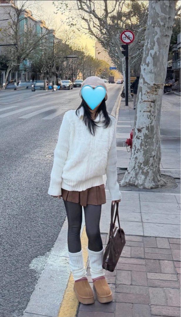 White fluffy zip-up jacket with knit sleeves (Category: Coats, Jackets and Outerwear) located in Rizal. Submitted by tomatoramenn (Listing ID 1470411255, Image 3). Description: - Color: White - Material: Fluffy faux fur body with ribbed knit sleeves and collar - Closure: Full front zipper - Condition: Worn once for photosi, excellent shape and super clean - Features: Warm, cozy texture, ideal for layering in cold weather Perfect for winter outfit