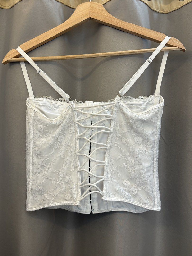 White Lace Corset Top (Category: Sleeveless) located in Manila. Submitted by perwinkle.ph (Listing ID 1470433480, Image 2). Description: - structured boning throughout bodice - adjustable double straps - clean with no stains or damage - used once.