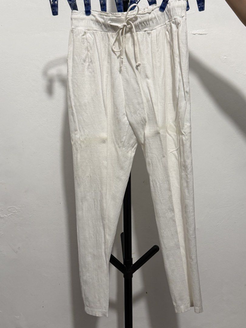 White Linen Drawstring Trousers Casual Pants (Category: Trousers) located in Mandaluyong City. Submitted by jdflores17 (Listing ID 1470456440, Image 1). Description: - Color: White - Material: Lightweight, breathable linen - Waistband: Elastic with an adjustable drawstring tie - Fit: Relaxed fit with a straight-cut leg - Style: Clean, minimalist look ideal for warm weather, beach trips, and casual wear - Pairing: Easily matches with basic tees an