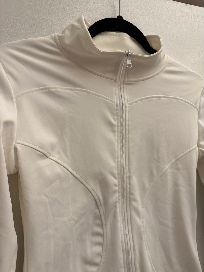 White Long sleeve Zip up Workout Clothing Medium (Category: Activewear) located in Manila. Submitted by closetclearout.mnl (Listing ID 1470391516, Image 1). Description: - workout fabric - breathable - Medium - bought a big size .