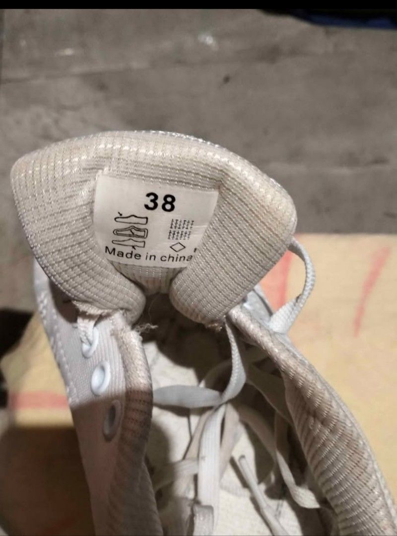 White Mesh Sneakers Size 38 (Category: Sneakers) located in Quezon City. Submitted by juliaela (Listing ID 1470393970, Image 1). Description: - Style: Casual low-top athletic sneakers - Color: Classic White - Size: 38 (printed on inner tongue tag) - Material: Breathable knit mesh upper with chunky sole - Comfort: Built-in air cushion unit in the heel - Closure: Lace-up with matching white laces - Once lang sinuot sa cheer dance.