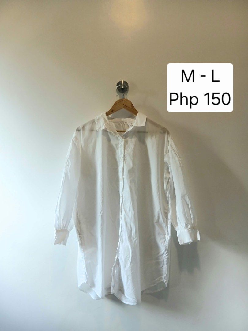 White Oversized Button Down Dress with Pockets (Category: Dresses) located in Antipolo. Submitted by wisecat.4a7eea (Listing ID 1470399446, Image 1). Description: - Color: Classic White - Fit: Oversized (fits Medium to Large) - Features: Long sleeves with gathered cuffs, classic collar neckline - Bonus: Comes with 2 super handy side pockets - Styling: Easily pairs with jeans or shorts for an effortless look.