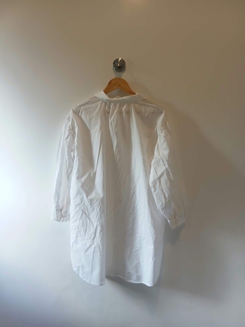 White Oversized Button Down Dress with Pockets (Category: Dresses) located in Antipolo. Submitted by wisecat.4a7eea (Listing ID 1470399446, Image 3). Description: - Color: Classic White - Fit: Oversized (fits Medium to Large) - Features: Long sleeves with gathered cuffs, classic collar neckline - Bonus: Comes with 2 super handy side pockets - Styling: Easily pairs with jeans or shorts for an effortless look.