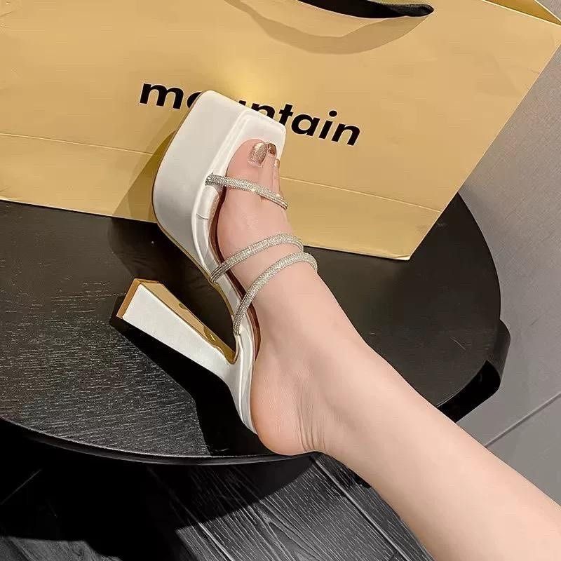White Platform heels sandals (Category: Sandals) located in Cavite. Submitted by wishie_collects (Listing ID 1470543905, Image 3). Description: Size 38-38.5 keri sa wide feet.