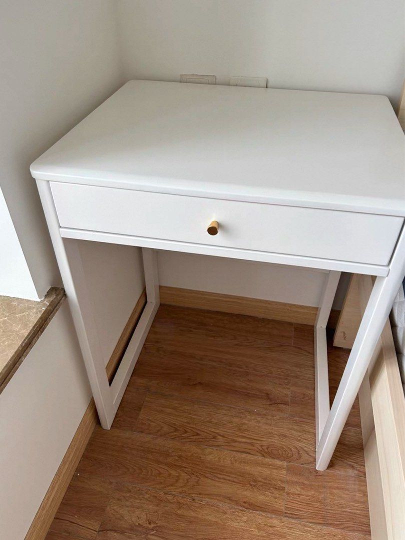 White Study Desk with Single Drawer and Gold Knob (Category: Tables & Sets) located in Marikina City. Submitted by lovegoeson (Listing ID 1470398317, Image 1). Description: - Color: Clean white finish with elegant gold-toned knob handle - Storage: Convenient pull-out drawer for stationery and essentials - Design: Sturdy angled white metal frame legs - Size: Compact footprint, ideal for small bedrooms, dorms, and tight study spaces - Condition: Cl