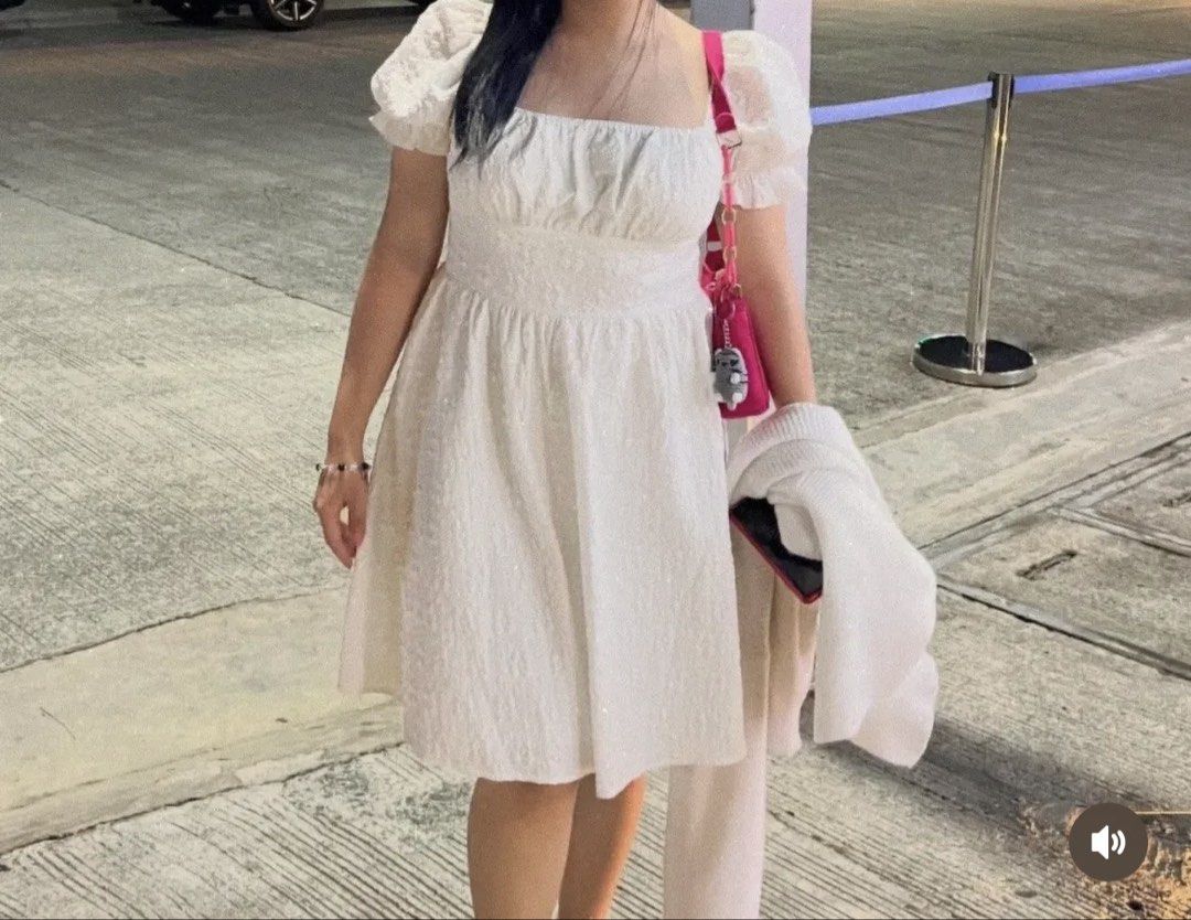 White textured puff sleeve square neck mini dress (Category: Dresses) located in Manila. Submitted by cole0702 (Listing ID 1470099418, Image 2). Description: Super pretty white mini dress featuring cute puff sleeves, a flattering square neckline, and a textured floral pattern. It has a fitted bodice and a comfy smocked back. Lightweight and perfect for any day out! * Please manage expectations (this is not brand new) * Color may slightly vary due