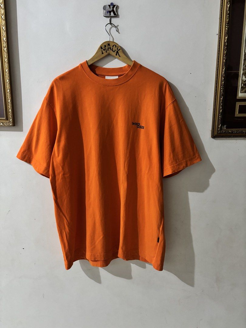 WHOOSIS Orange Graphic Tee Size XL (Category: Tshirts & Polo Shirts ) located in Kalibo. Submitted by mack29 (Listing ID 1470350817, Image 2). Description: Tags: Woven brand label on lower hem and inner neck - Mode of Payment: GCash, - Shipping: Ships nationwide via J&T Express.
