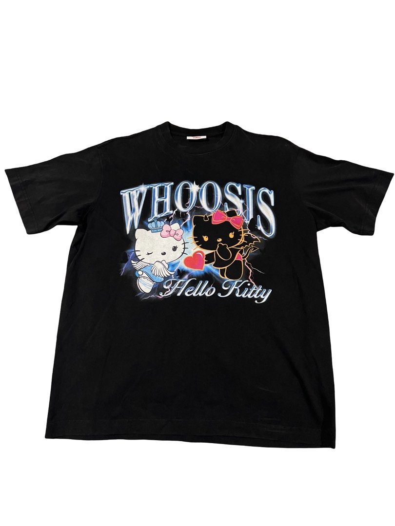 Whoosis x Hello Kitty Black Graphic Tee (Category: Shirts) located in San Carlos. Submitted by binaryapparelco (Listing ID 1470485474, Image 1). Description: - Brand: Whoosis x Kitty (Official Sanrio 2023 collaboration) - Color: Black - Size: M (170/88A), relaxed short-sleeve cut with standard crew neck - Design: Front graphic with Kitty characters, lightning/star details, and 'Whoosis' lettering 📌 Dimes:W- 22.5/ L- 28.5 📌 Color rate: 9.2/10 📌