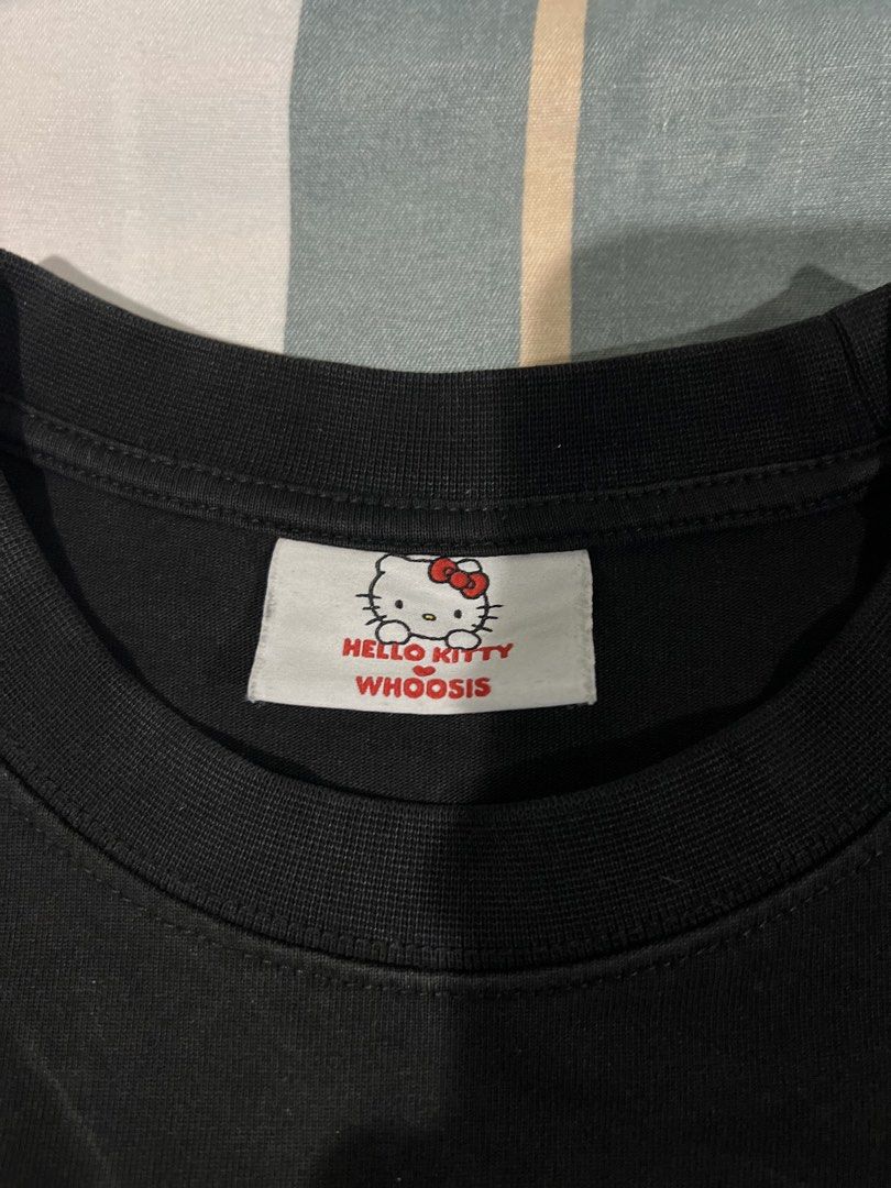 Whoosis x Hello Kitty Black Graphic Tee (Category: Shirts) located in San Carlos. Submitted by binaryapparelco (Listing ID 1470485474, Image 3). Description: - Brand: Whoosis x Kitty (Official Sanrio 2023 collaboration) - Color: Black - Size: M (170/88A), relaxed short-sleeve cut with standard crew neck - Design: Front graphic with Kitty characters, lightning/star details, and 'Whoosis' lettering 📌 Dimes:W- 22.5/ L- 28.5 📌 Color rate: 9.2/10 📌
