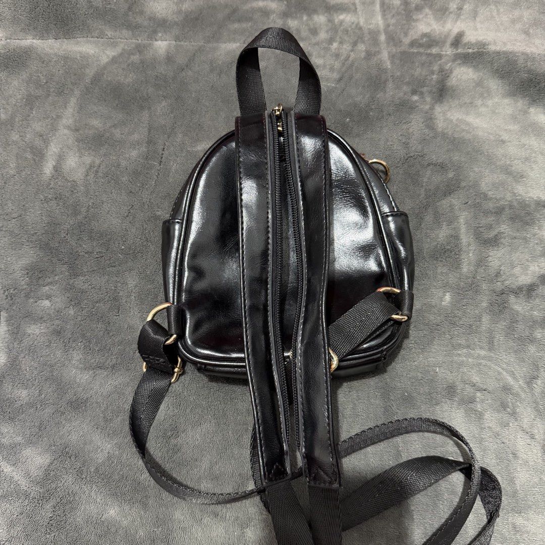 Wild Fable Zebra Print Faux Leather Mini Backpack (Category: Backpacks) located in Mandaluyong City. Submitted by josa_xox0i8 (Listing ID 1470518409, Image 2). Description: Selling a super cute pre-loved Wild Fable (Target US brand) mini dome backpack in zebra print! Perfect for daily casual carry, festival vibes, or street style outfits. 🦓🖤 🇺🇸 Original US Price: ~$15–$20 MSRP ✨ Product Details: • Brand: Wild Fable (100% Authentic US Bought) 
