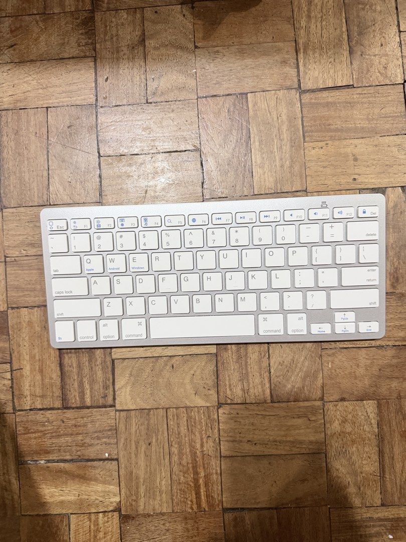 Wireless Bluetooth Keyboard BK3001 Silver White (Category: Computer Keyboard) located in Paranaque City. Submitted by hannahking36 (Listing ID 1470555180, Image 1). Description: - Model: BK3001 Wireless Bluetooth Keyboard - Color: Sleek silver and white finish - Layout: Compact QWERTY setup with a full row of function keys - Connectivity: Seamless wireless connection to multiple devices - Features: Convenient power switch and connect button locat