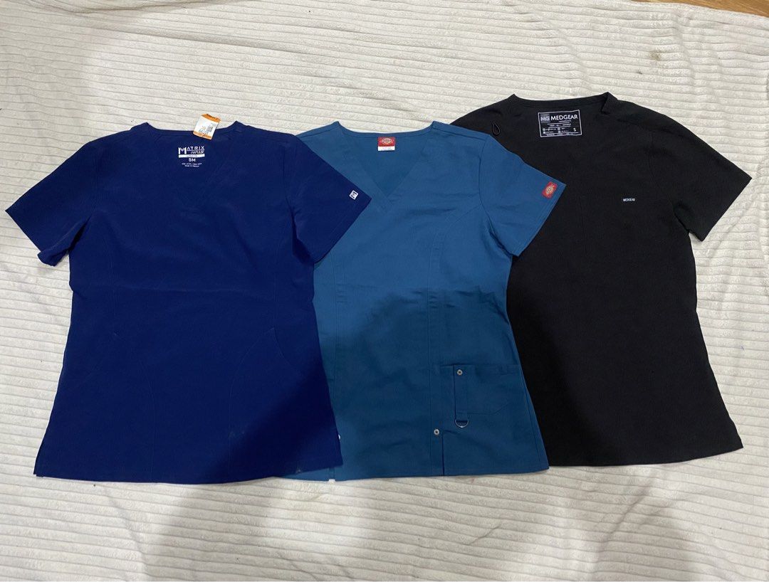 Womens scrub top (Category: Activewear) located in Tanza. Submitted by 9th.street.thrift (Listing ID 1470408746, Image 1). Description: Scrub top womens Good as new No issue Brand: dickies/matrix/medgear All small on tag 19.5x26 All 3 for (500+sf) fixed price.