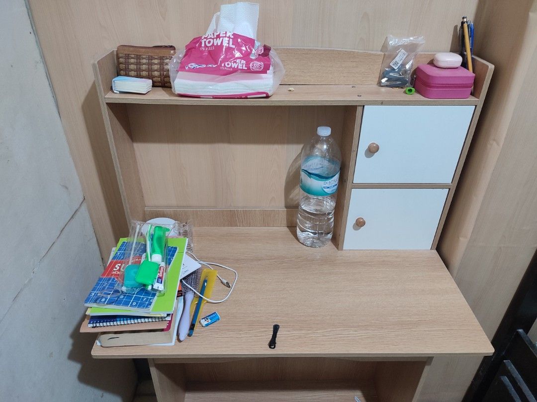 Wooden Study Table with Bookshelf and Storage Cabinets (Category: Tables & Sets) located in Paranaque City. Submitted by breealigam24841 (Listing ID 1470449515, Image 3). Description: Rural oak finish wooden study table - Includes upper shelf, two white storage cabinets on the right, and a lower shelf - Sturdy setup ideal for working or studying - Dimensions: 80x43x120 cm - Reason for selling: Will be moving out of my apartment - Note: Items curr
