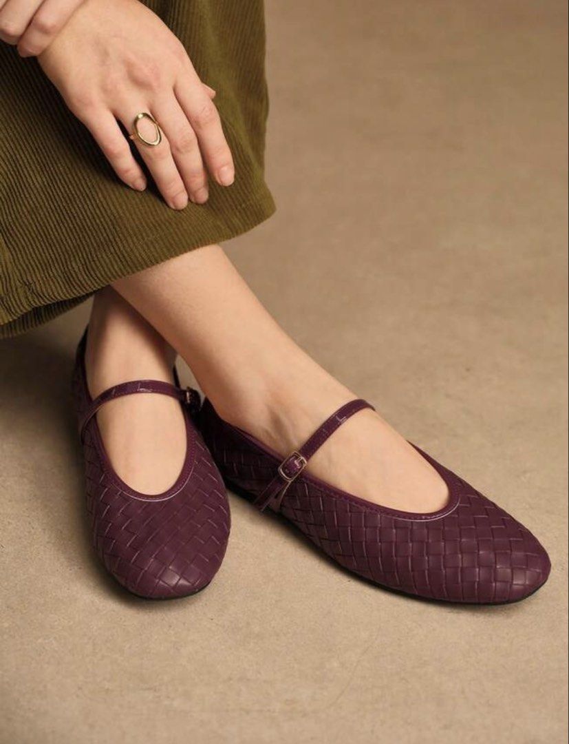 Woven Mary Jane Flats in Deep Plum (Category: Flats & Sandals) located in Taguig. Submitted by heyitsfrann (Listing ID 1470392849, Image 2). Description: - Style: Woven leather Mary Jane flats with a classic round toe - Color & Finish: Rich plum shade with glossy trim - Details: Adjustable strap featuring a gold-tone buckle, low heel, and flat sole - Versatility: Pairs easily with both trousers and skirts - Condition: Like new / Excellent (ready 