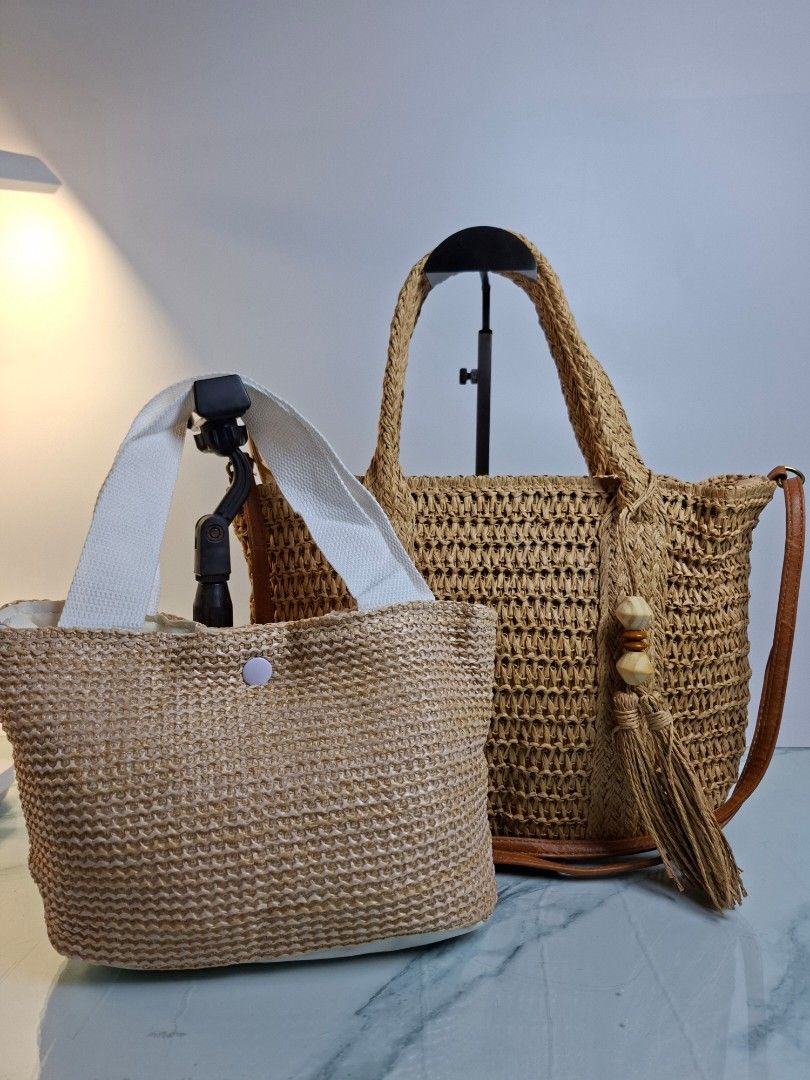Woven Straw Handbag with Tassel and Brown Straps Bundle (Category: Shoulder Bags) located in Pasay City. Submitted by onick_79 (Listing ID 1470415655, Image 2). Description: - Stylish tan woven straw design with an open weave texture - Features brown faux leather shoulder straps and top handles - Cute side tassel pendant accented with wooden beads - Secure top zipper closure to keep your belongings safe - Lightweight and ideal for summer outings,