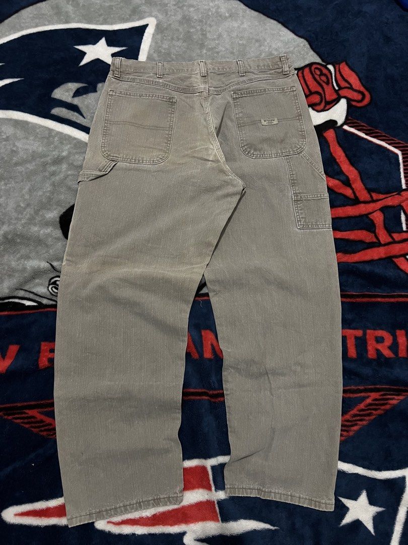 Wrangler Carpenter Pants Grey Size 36x32 (Category: Jeans) located in Tanza. Submitted by 1954_street (Listing ID 1470379263, Image 1). Description: WRANGLER DESERT BROWN CARPENTER 36 waist 41 length 9 leg op minor tattered parts and fade part 500 - Brand: Wrangler - Style: Classic relaxed fit carpenter workwear pants - Color: Grey - Size: 36 x 32 - Material: Durable cotton - Features: Utility pockets and hammer loop - Condition: Normal wash wear